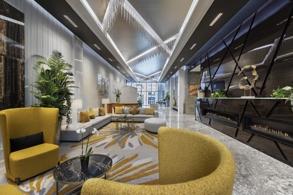 a lobby with chairs in intimate configurations